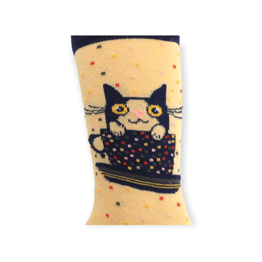 A pair of unisex cat in a cup design casual cotton socks laid flat