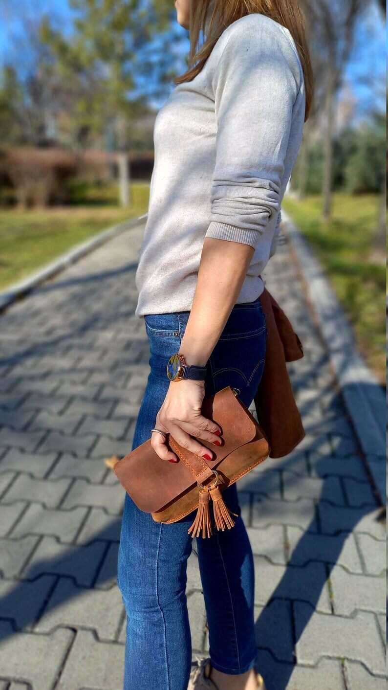 Top-down view of handmade black leather waist bum bag