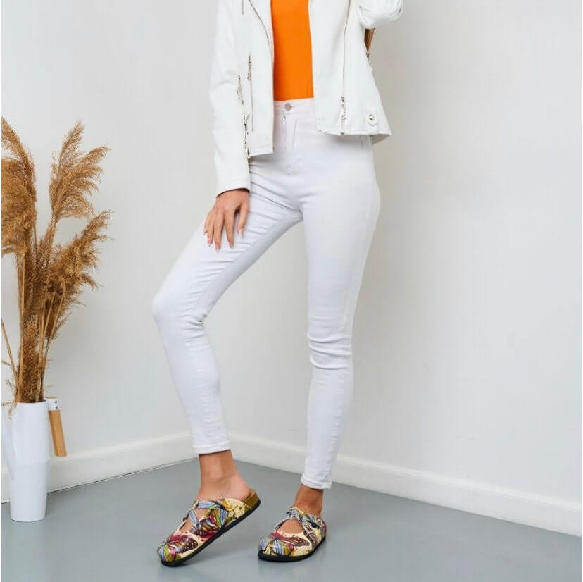 Yellow butterfly leather cork sole clogs worn on the foot