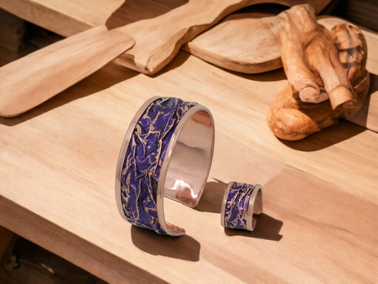 Front view of four-piece purple wrinkled copper jewellery set