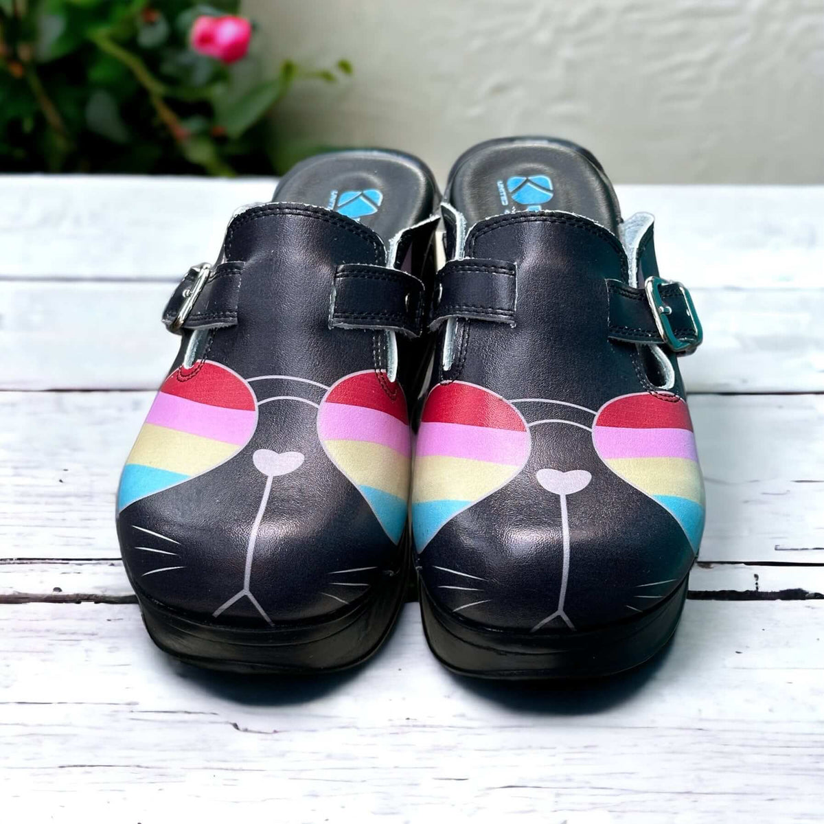 Heel and back view of colourful cat glasses leather clogs with an Air Clogx sole