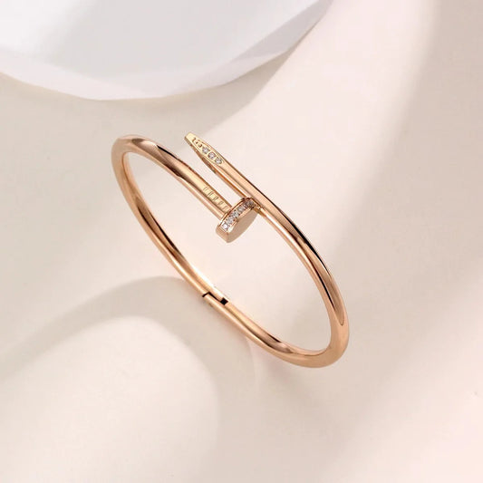 Rose gold nail style stainless steel bangle bracelet
