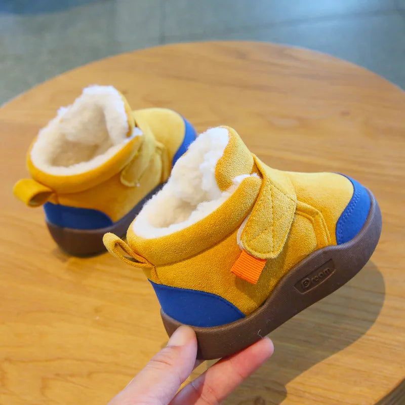 Front view of warm unisex winter baby boots with a non-slip first walker sole