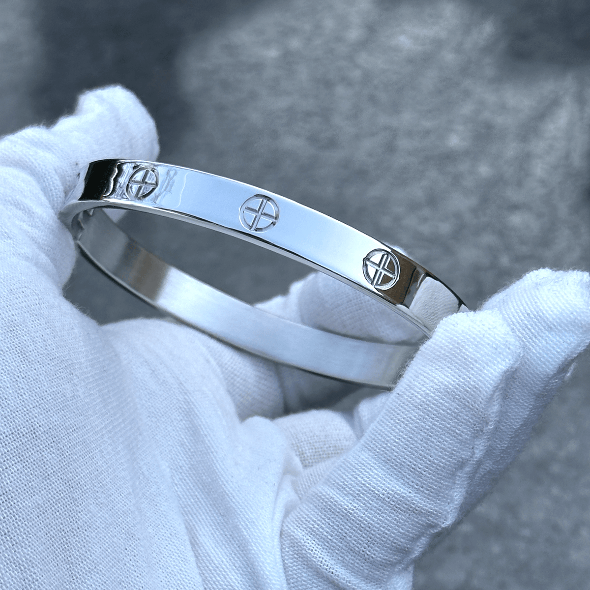Stainless steel couple bangle bracelet set in 6mm and 8mm displayed on a plain background