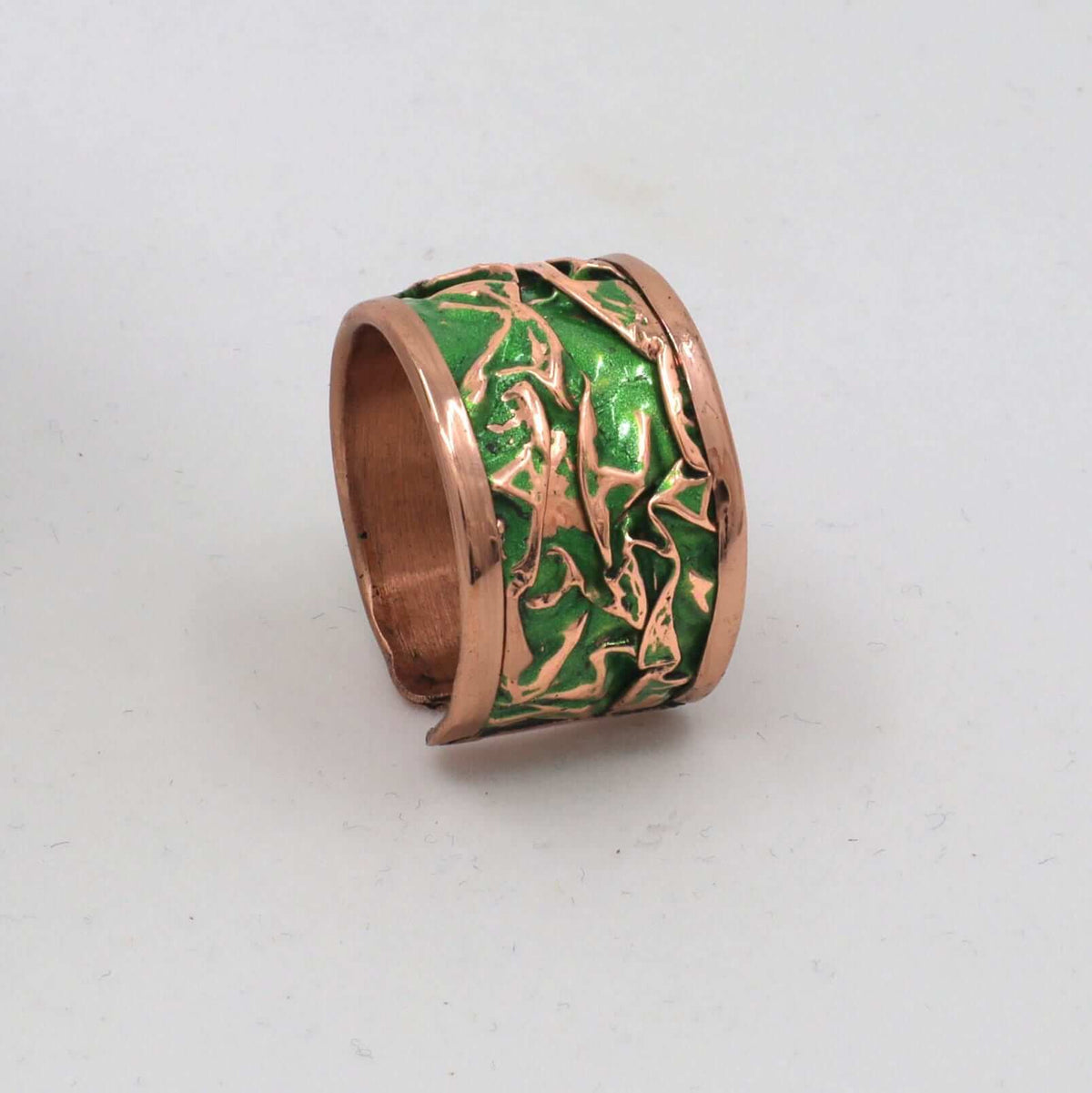 Top-down view of complete green wrinkled copper jewellery set