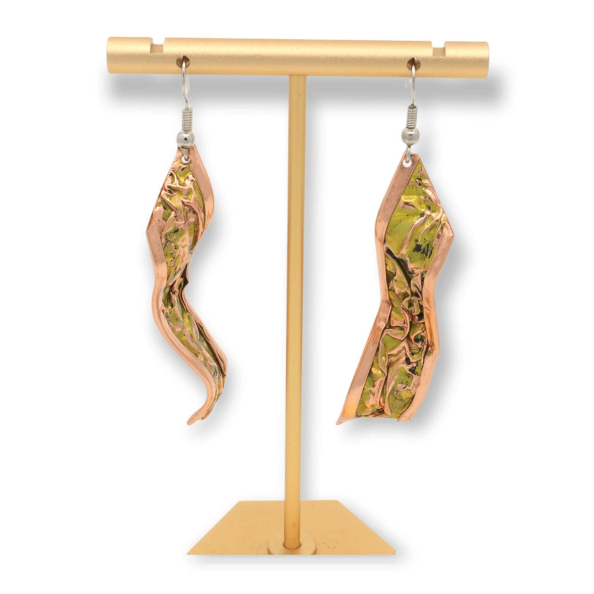 Angled view of four-piece yellow wrinkled copper jewellery set
