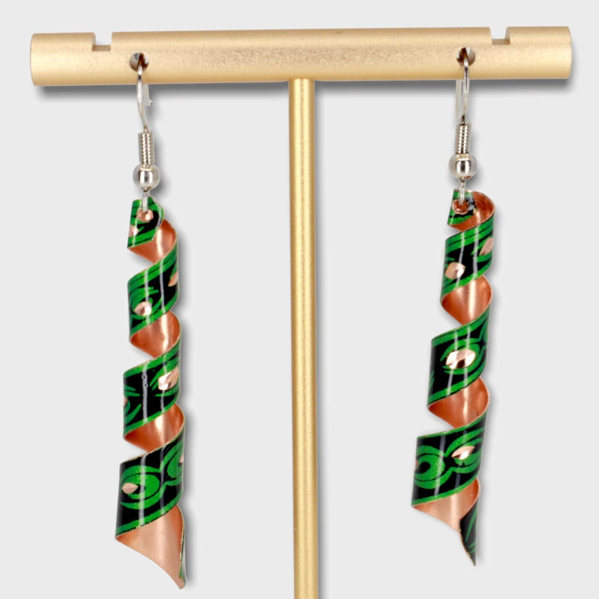 Side angle of handcrafted artisan green auger copper earrings