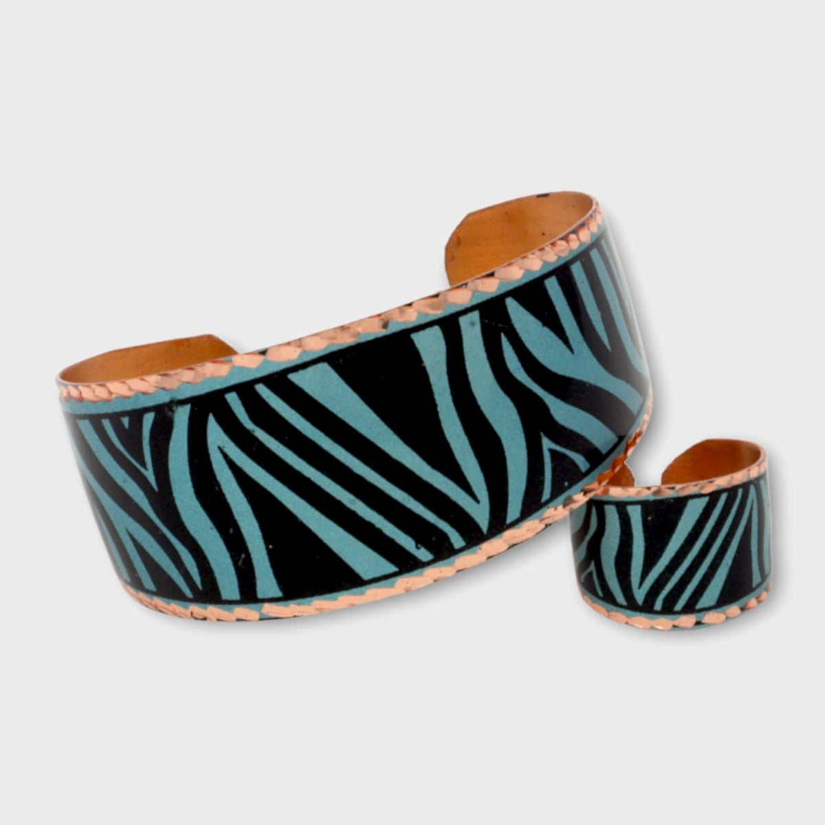 Top-down view of adjustable turquoise copper ring and bracelet set