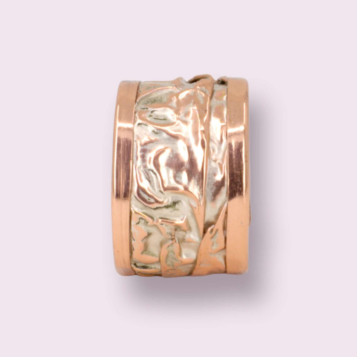 Close-up of the adjustable open band on artisan silver wrinkled copper adjustable ring