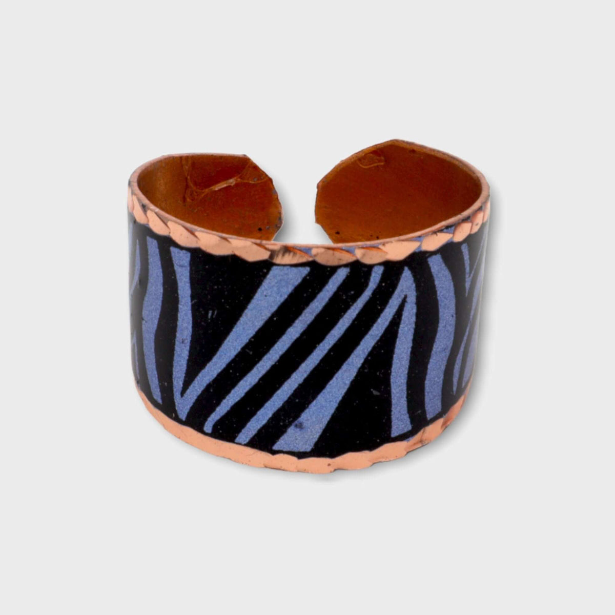 Top-down view of adjustable blue copper ring and bracelet jewellery set