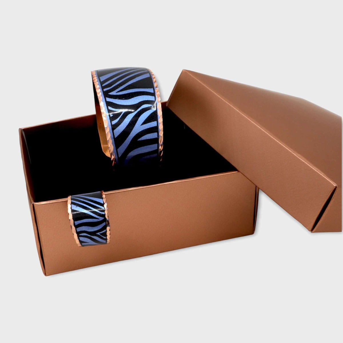 Close-up of the copper texture in adjustable blue copper ring and bracelet jewellery set