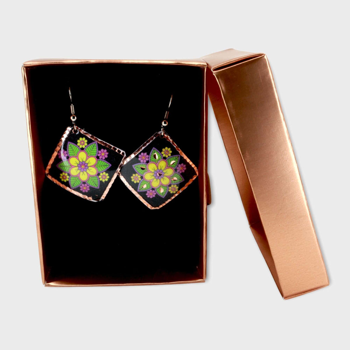 Back view of handcrafted square yellow flower copper earrings