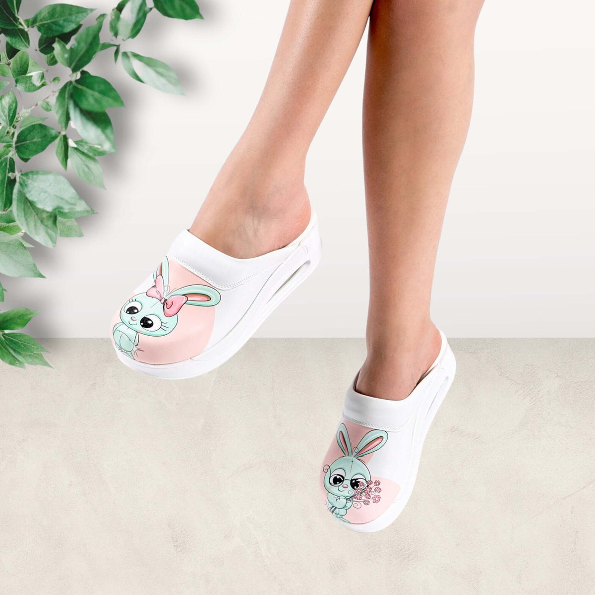 Top-down view of bunny design leather clog slippers in style 2 with an Air Clogx sole