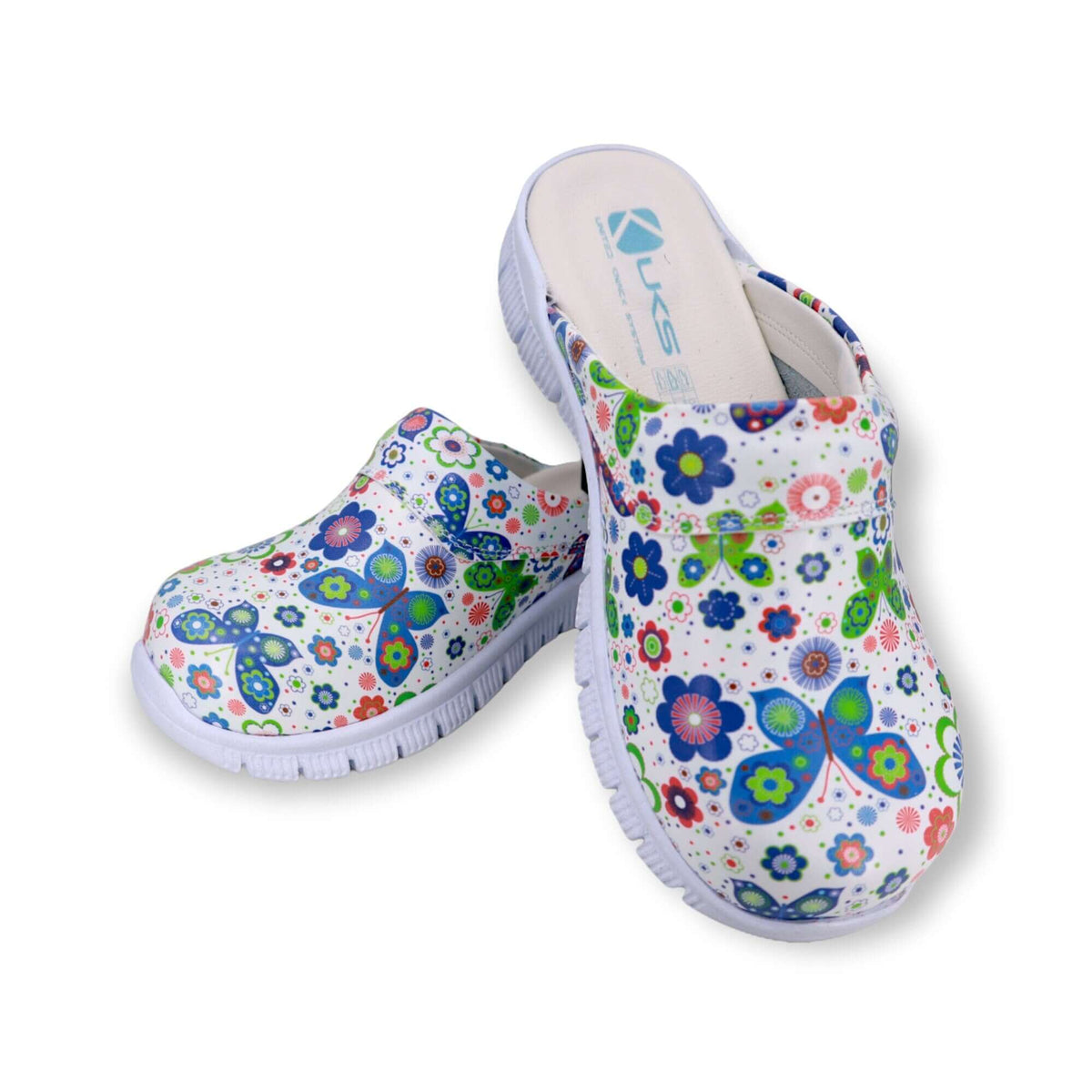 Side profile of handmade butterfly design leather clogs with a Comfortflex sole