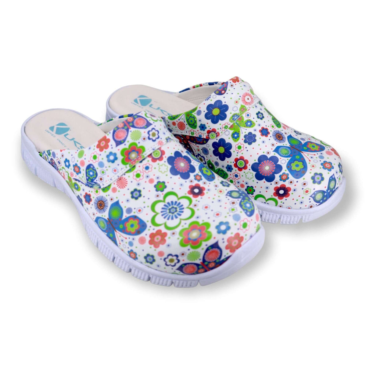Top-down view of handmade butterfly design leather clogs with a Comfortflex sole